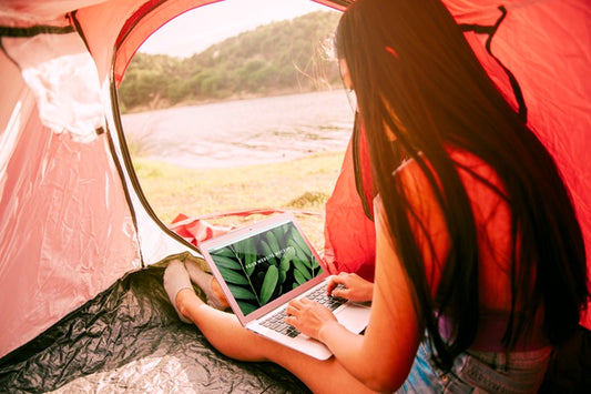 Free Laptop Mockup With Camping In Nature Concept Psd