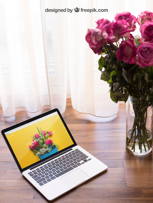 Free Laptop Mockup With Flowers Psd