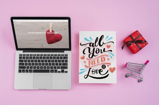 Free Laptop Mockup With Valentines Day Elements Psd