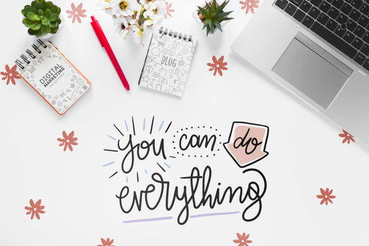 Free Laptop Notebooks And Motivational Message On White Desk Psd