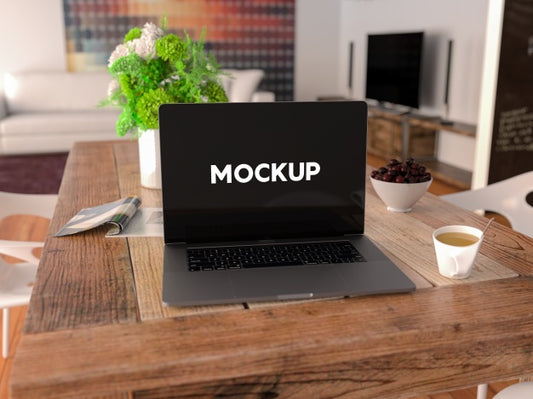 Free Laptop On A Table Mock Up Design Psd