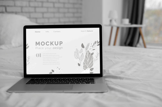 Free Laptop On Bed Mock Up Psd