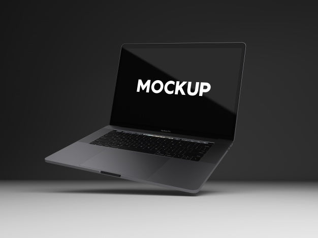 Free Laptop On Black Background Mock Up Design Psd