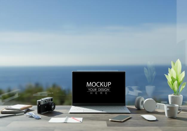 Free Laptop On Desk In Workspace Mockup Psd