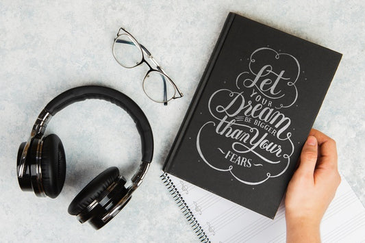 Free Let Your Dream Be Bigger Than Your Fears Quote Book And Headphones Psd