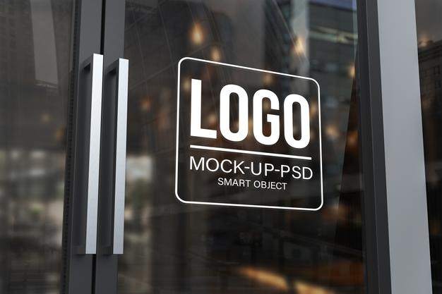 Free Logo Mockup On The Glass Door Psd