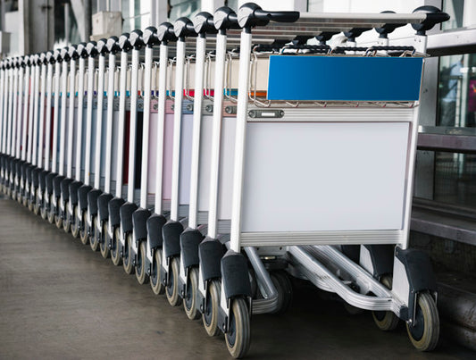 Free Luggage Trolley At The Airport With Sign Mockup Psd