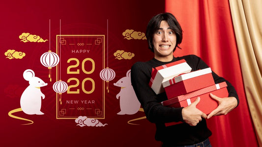 Free Male Holding Gift Boxes For New Year Psd