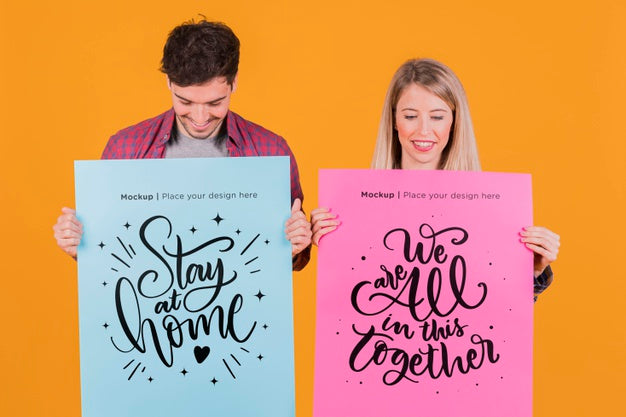 Free Man And Woman Holding A Sign Concept Mock-Up Psd