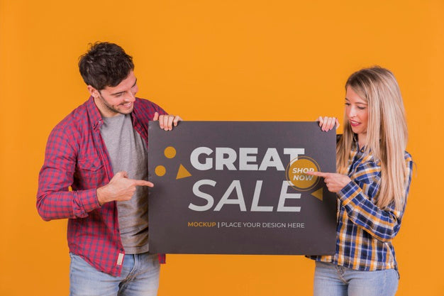 Free Man And Woman Holding A Sign Concept Mock-Up Psd