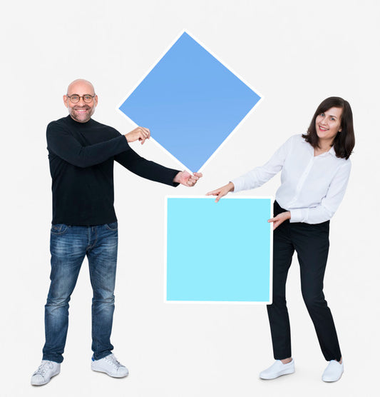 Free Man And Woman Holding Squares Psd
