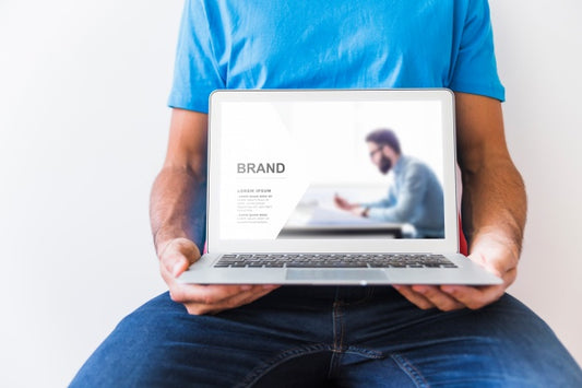 Free Man Holding Laptop Psd