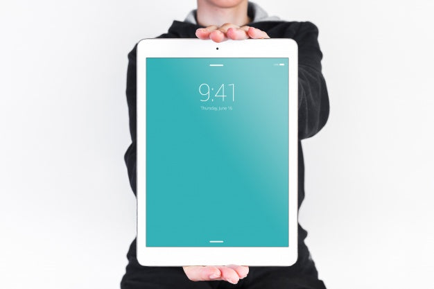 Free Man Holding Tablet Mockup Psd