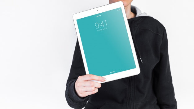 Free Man Holding Tablet Mockup Psd