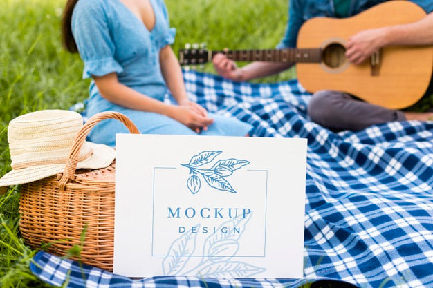 Free Man Playing Guitar Picnic Mock-Up Psd