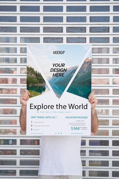 Free Man Presenting Poster Mockup In Front Of Gate Psd