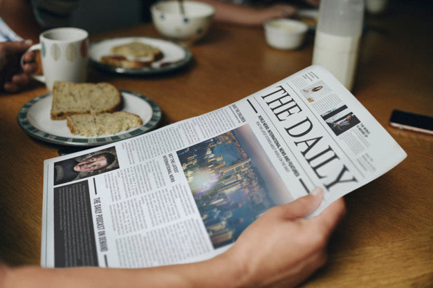 Free Man Reading The News At The Breakfast Table Psd
