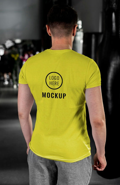 Free Man Wearing Boxing T-Shirt Mock-Up Psd