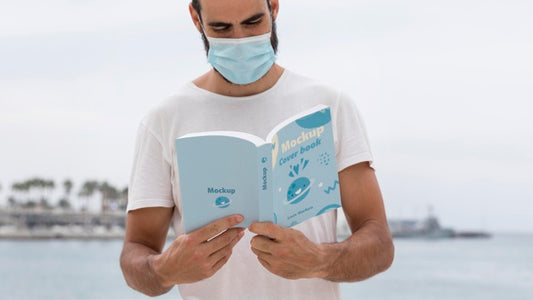 Free Man With Mask On Street Reading Book Psd