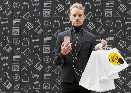 Free Man With Mobile In Hand And Shopping Bags Psd
