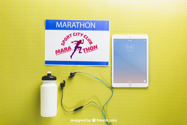Free Marathon Mockup With Tablet Psd