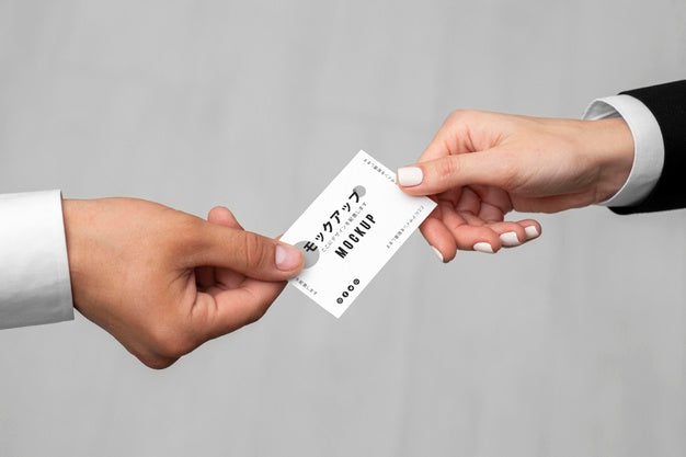 Free Men Holding A Business Card Mock-Up Psd