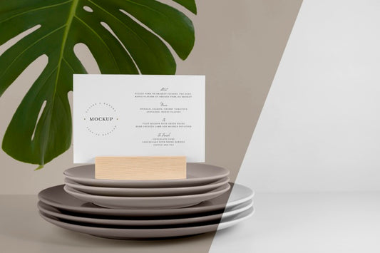 Free Menu Mock-Up With Monstera Leaf And Dishes Psd
