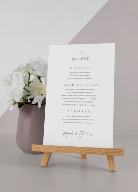 Free Menu Mock-Up With Wooden Stand And Flower Vase Psd