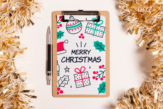 Free Merry Christmas Mock-Up Clipboard And Golden Tinsel Psd