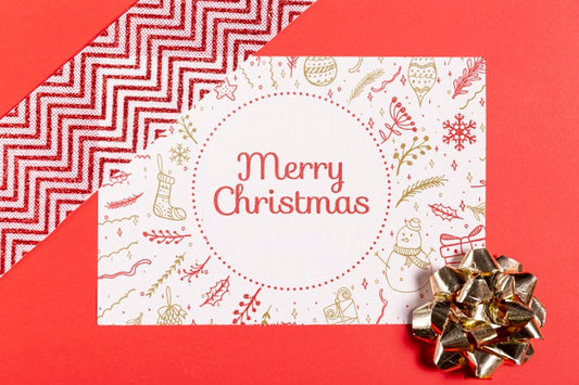 Free Merry Christmas Mock-Up Paper With Bow And Ribbon Psd