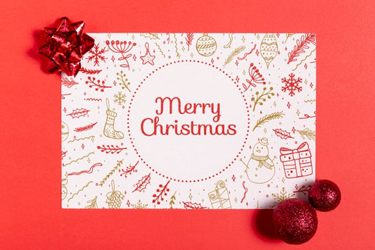 Free Merry Christmas Mock-Up Paper With Bows Ans Balls Psd