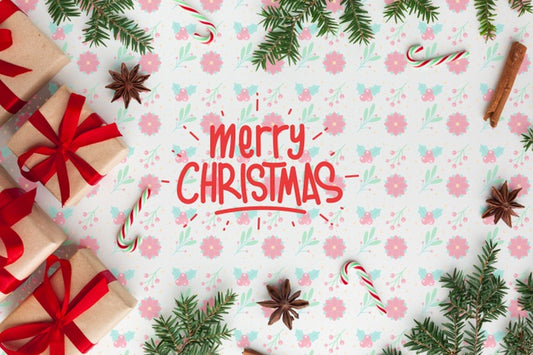 Free Merry Christmas On Floral Background Top View Psd