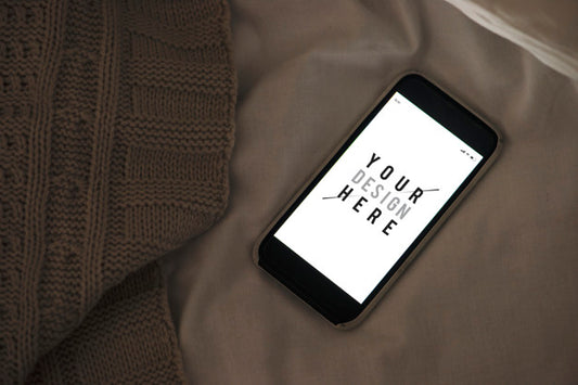 Free Mobile Phone Screen Mockup On Sheet Surface Psd