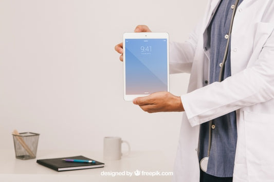 Free Mock Up Design With Doctor'S Hands Holding Tablet Psd