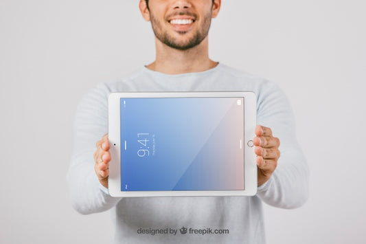 Free Mock Up Design With Man Holding Horizontal Tablet Psd