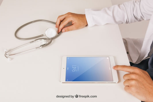 Free Mock Up Design With Medical Doctor Working With Tablet Psd