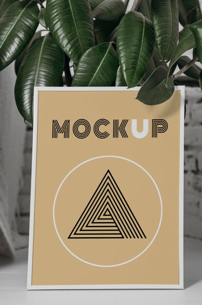 Free Mock Up Frame Next To Plant Psd
