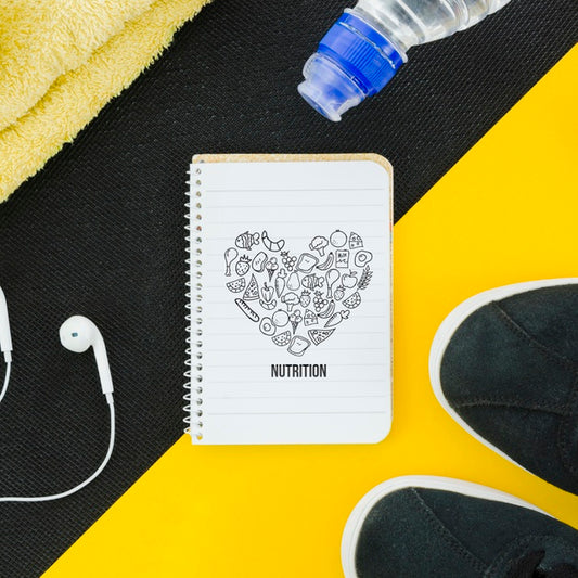Free Mock-Up Notebook And Sport Equipment Psd