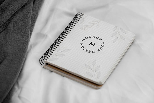 Free Mock Up Notebook On Bed Psd