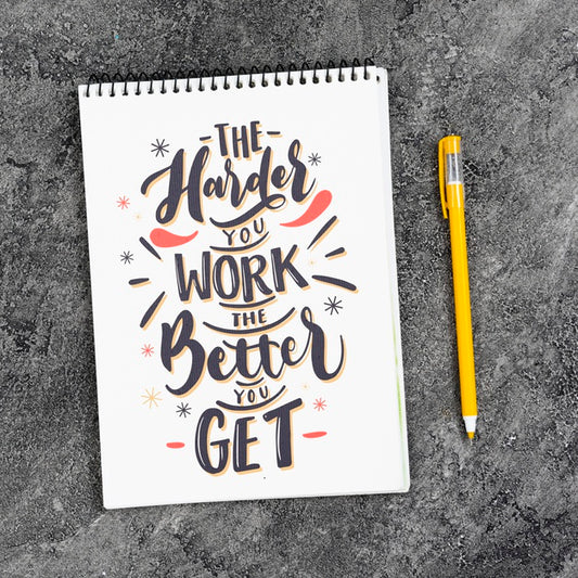 Free Mock-Up Notebook On Desk With Powerful Message Psd
