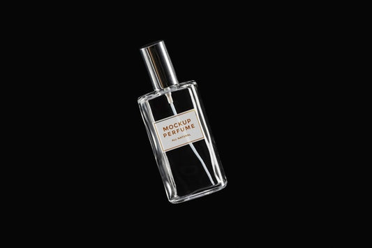 Free Mock-Up Of Clear Bottle Of Perfume On Black Background Psd