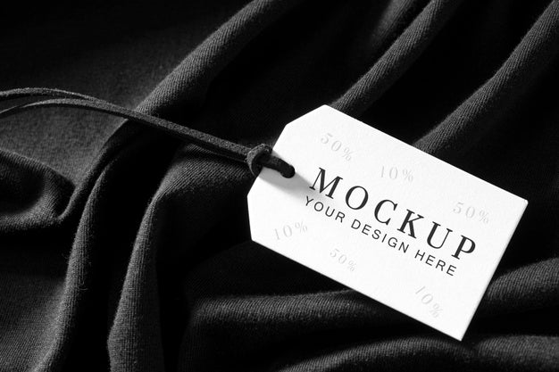 Free Mock-Up Of Clothing Label On Black Soft Fabric Psd