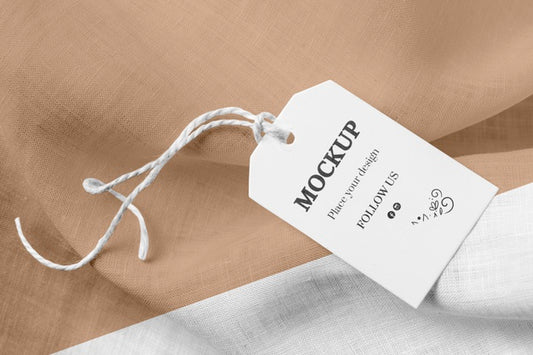 Free Mock-Up Of Clothing Label On Brown Soft Fabric Psd