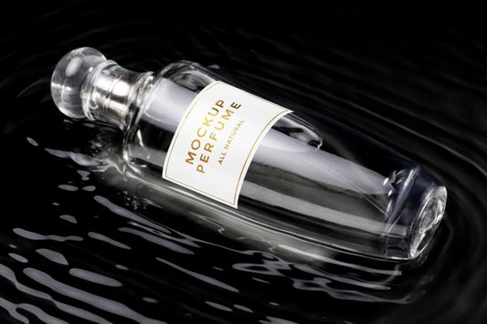 Free Mock-Up Of Glass Bottle Of Perfume With Clear Water Psd