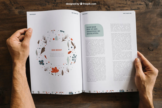 Free Mock Up Of Hands And Open Brochure Psd