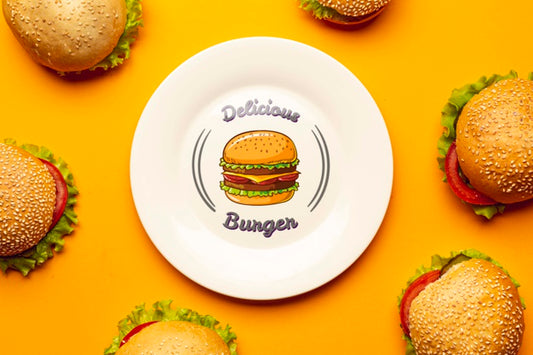 Free Mock-Up Plate Surrounded By Delicious Burgers Psd