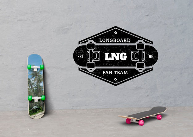 Free Mock-Up Skateboards Next To Logo Psd