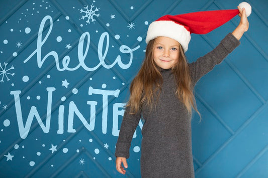 Free Mock-Up With Girl Wearing Santa Hat Psd