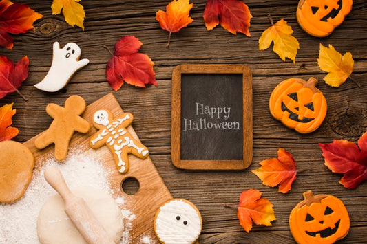 Free Mock-Up With Halloween Treats And Autumn Leaves Psd