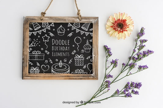 Free Mockup Design With Birthday Slate And Floral Decoration Psd